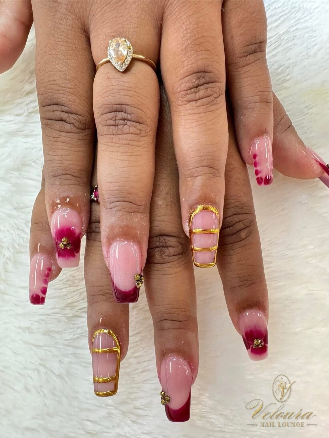 Hand-painted nail design by Veloura Nail Lounge, Augusta GA