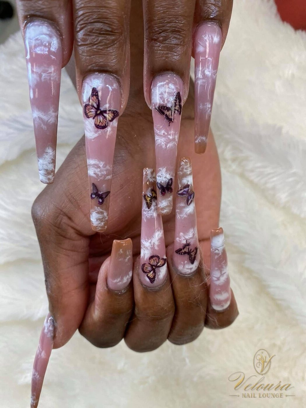 Hand-painted nail design by Veloura Nail Lounge, Augusta GA