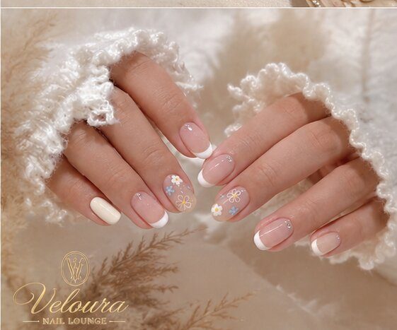 Hand-painted nail design by Veloura Nail Lounge, Augusta GA