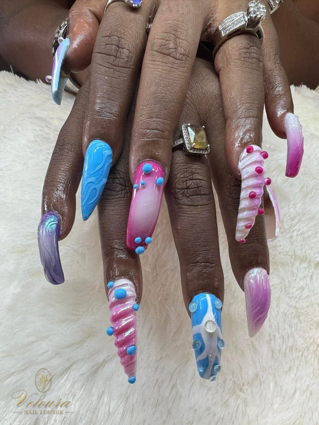 Hand-painted nail design by Veloura Nail Lounge, Augusta GA